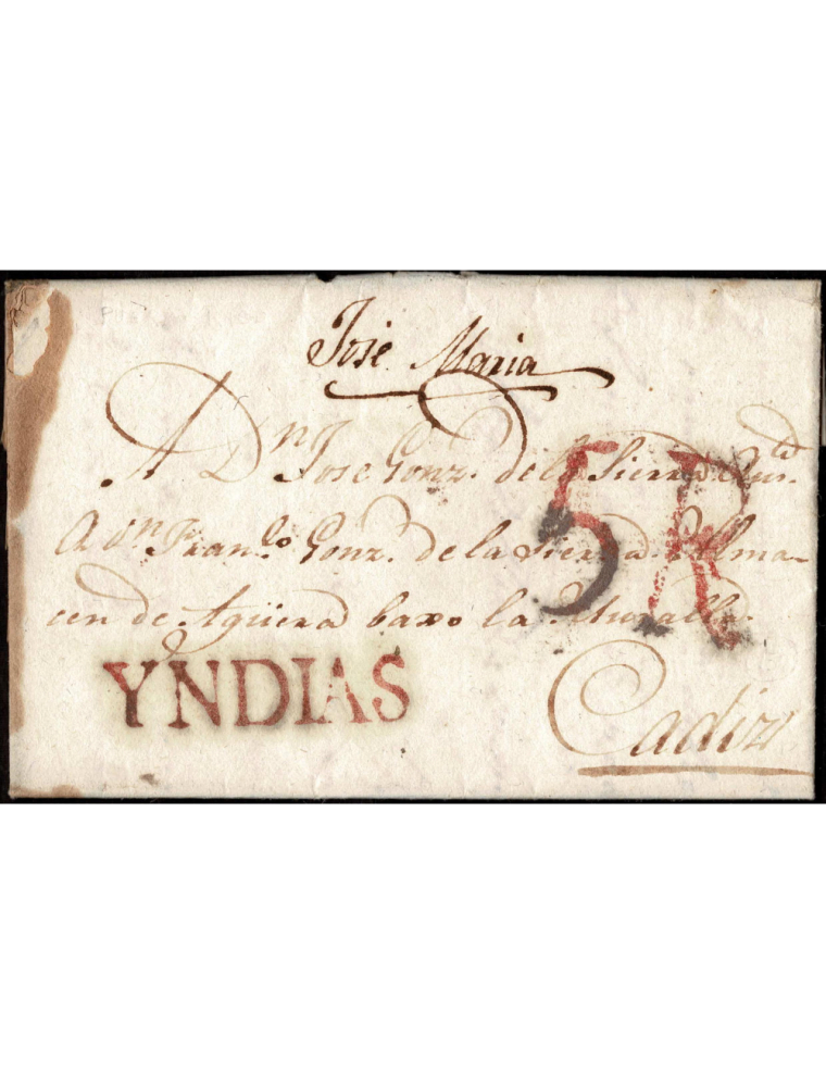 1824 (6 MAR) Puerto Rico a Cádiz. Sobrescrito con la marca “YNDIAS” en color rojo. Porteo “5R” reales en rojo de Cádiz. Marcas p