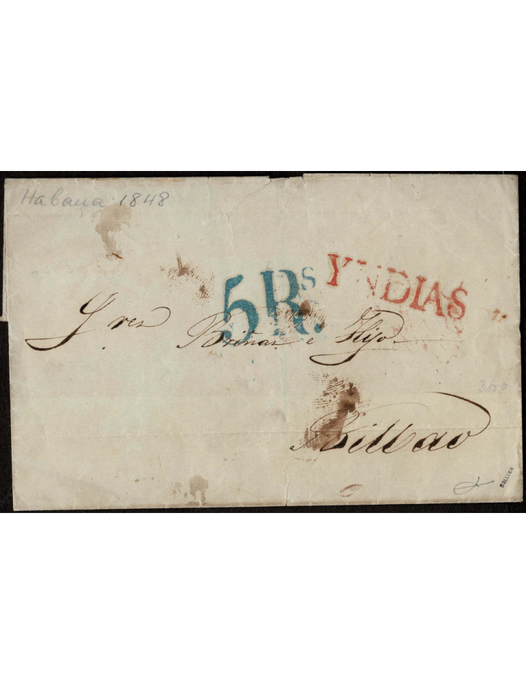 1848 (26 ENE) La Habana a Bilbao. Envuelta que a su llegada se estampó el “YNDIAS” en color rojo y el porte “5R” en verde azulad