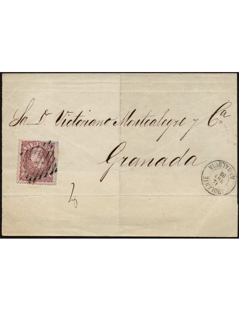 1871 (26 ABR) a Granada. Envuelta de un impreso franqueado con un sello de 1 mils. de escudo violeta mat. rejilla de once líneas